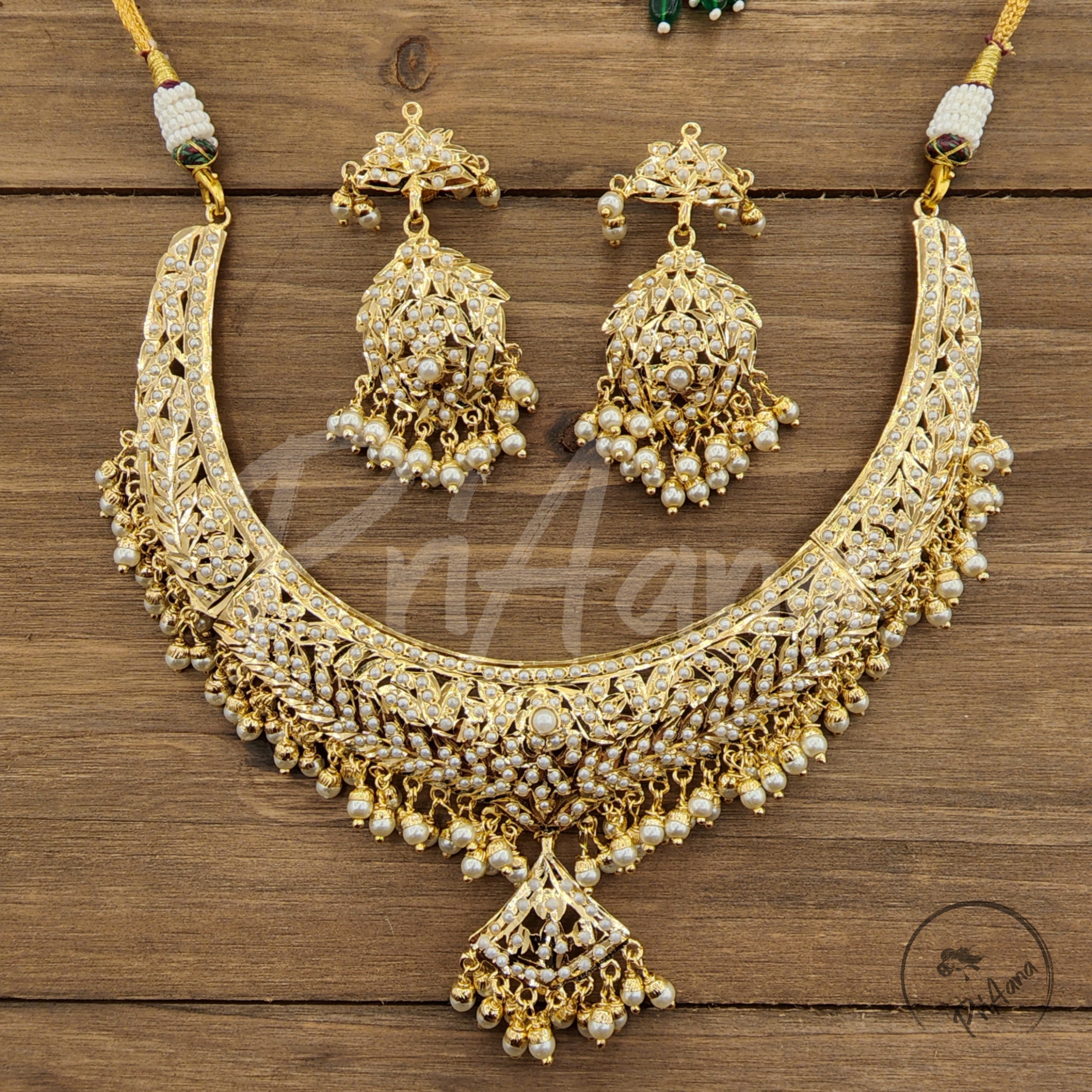 Aarini Jadau Necklace Set  with Semi Precious Pearls